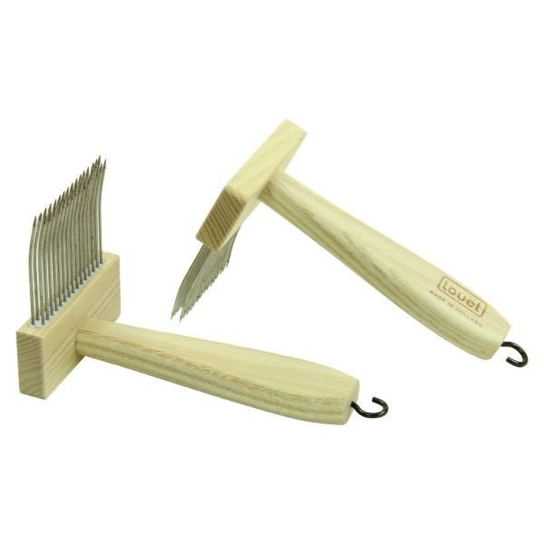 Two wooden wool combs with metal tines. One comb lies flat with the tines facing up, while the other is angled above it, showing its side view. Both have hooks on the opposite ends of the handles. The brand "Louet" is printed on the handles.
