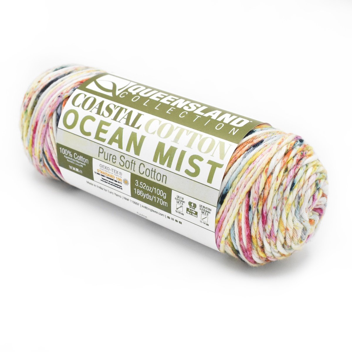 A skein of Queensland Collection Coastal Cotton yarn in the Ocean Mist colorway. The label indicates it is made of 100% pure soft cotton, weighs 100g, measures 170m, and is OEKO-TEX certified. The yarn is multicolored with shades of white, blue, and pink.