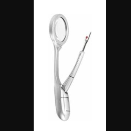 Lighted seam ripper with magnifier