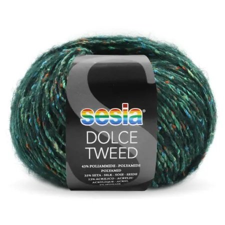 A skein of Sesia Dolce Tweed yarn, primarily dark green with specks of various colors, is labeled to indicate its composition of 43% polyamide, 38% wool, and 19% acrylic.