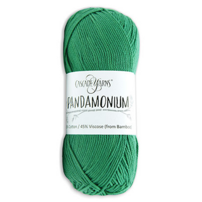 A skein of Cascade Yarns Pandamonium is shown in a vibrant green color. The label states the yarn is composed of 55% cotton and 45% viscose from bamboo. The company logo is positioned at the top of the label.