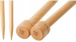 A close-up image of two wooden knitting needles. The ends of the needles are stamped with the number "15." The needles have a smooth finish and tapered points.