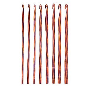 A set of nine wooden crochet hooks arranged in a line. The hooks vary in size, with the smallest on the left and the largest on the right. Each hook has a striped pattern of brown and orange hues.