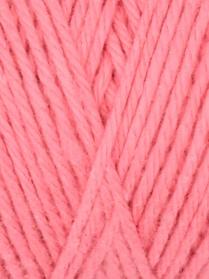 A skein of Queensland Collection Coastal Cotton yarn in a soft peach color. The label indicates it is made of pure soft cotton, weighing 3.5 ounces (100 grams), and measures 186 yards (170 meters).